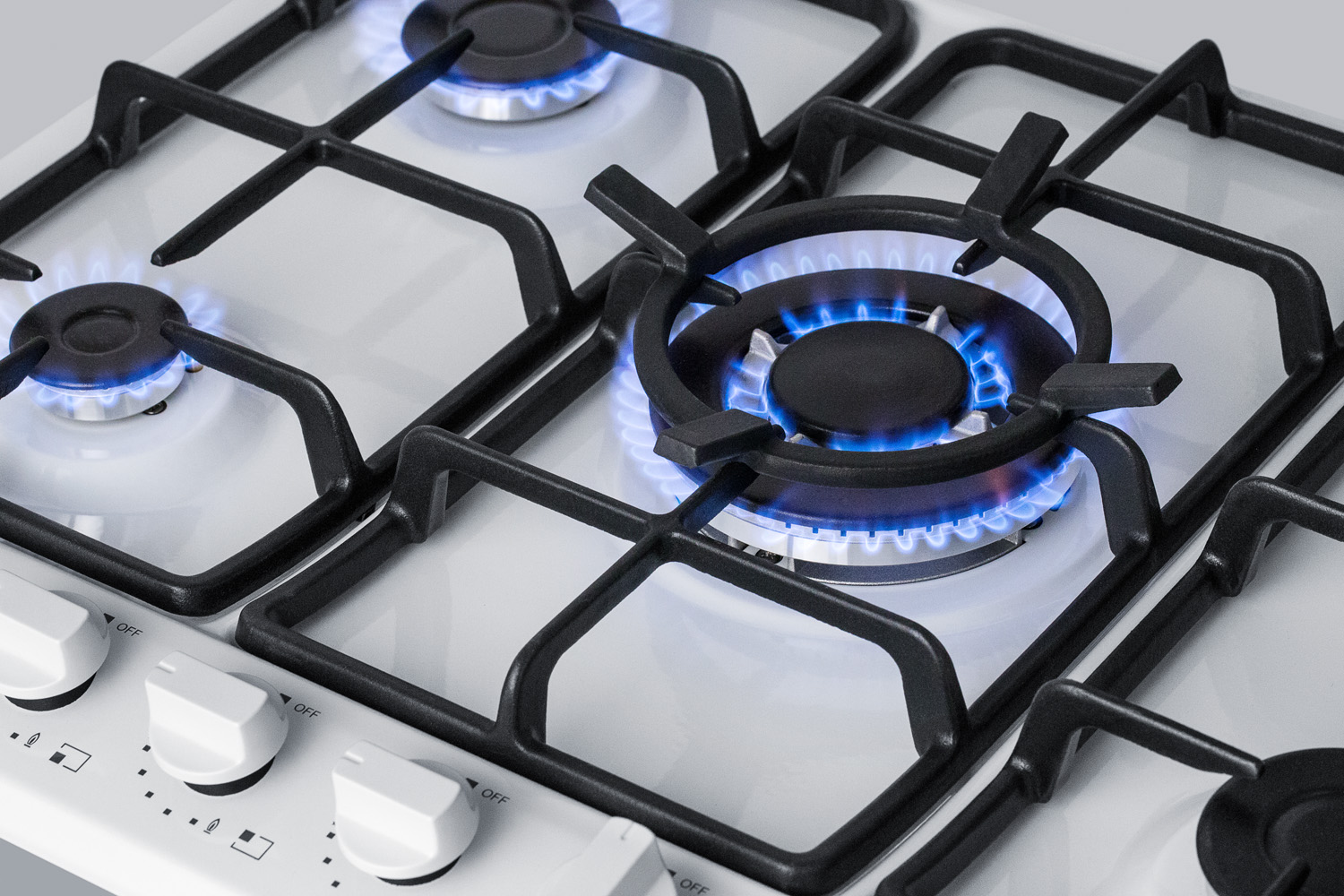 5-burner gas cooktop made in Italy in white finish with sealed burners, cast iron grates, wok stand, and stainless steel frame to allow installation in 30